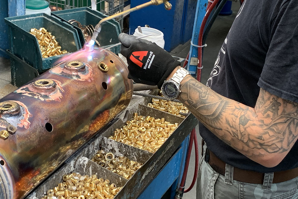 Bezzera Master Artisan hand crafting an espresso machine copper boiler